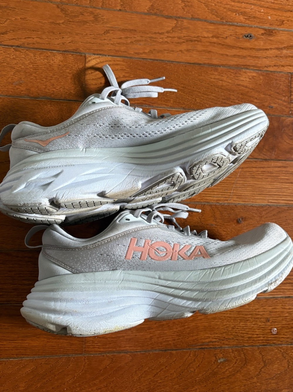 Hoka Women's Light Gray Athletic Running Shoes with Subtle Pink Accents - Picture 2 of 8